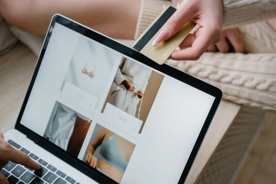 A customer entering payment details at checkout on a fashion site