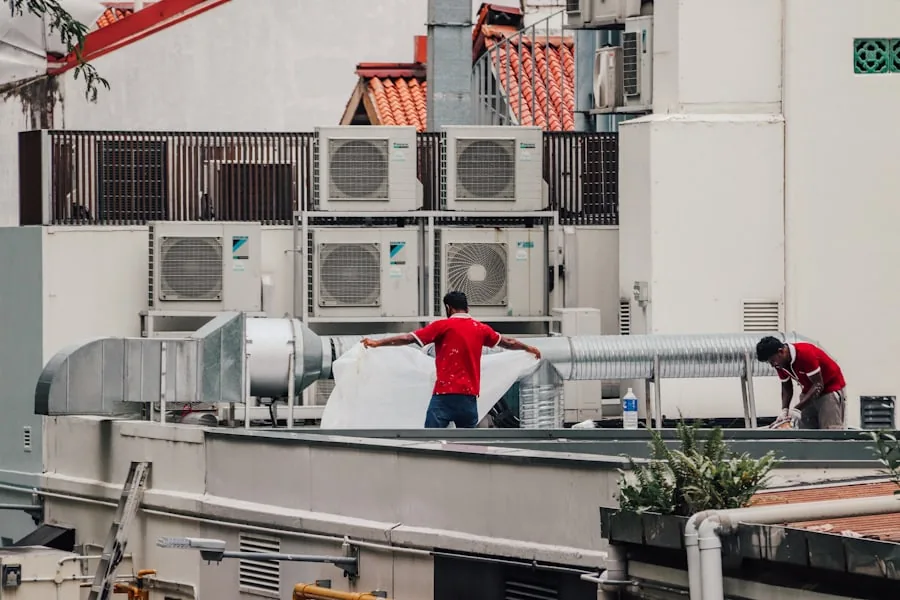 An HVAC technician servicing a unit on a residential job